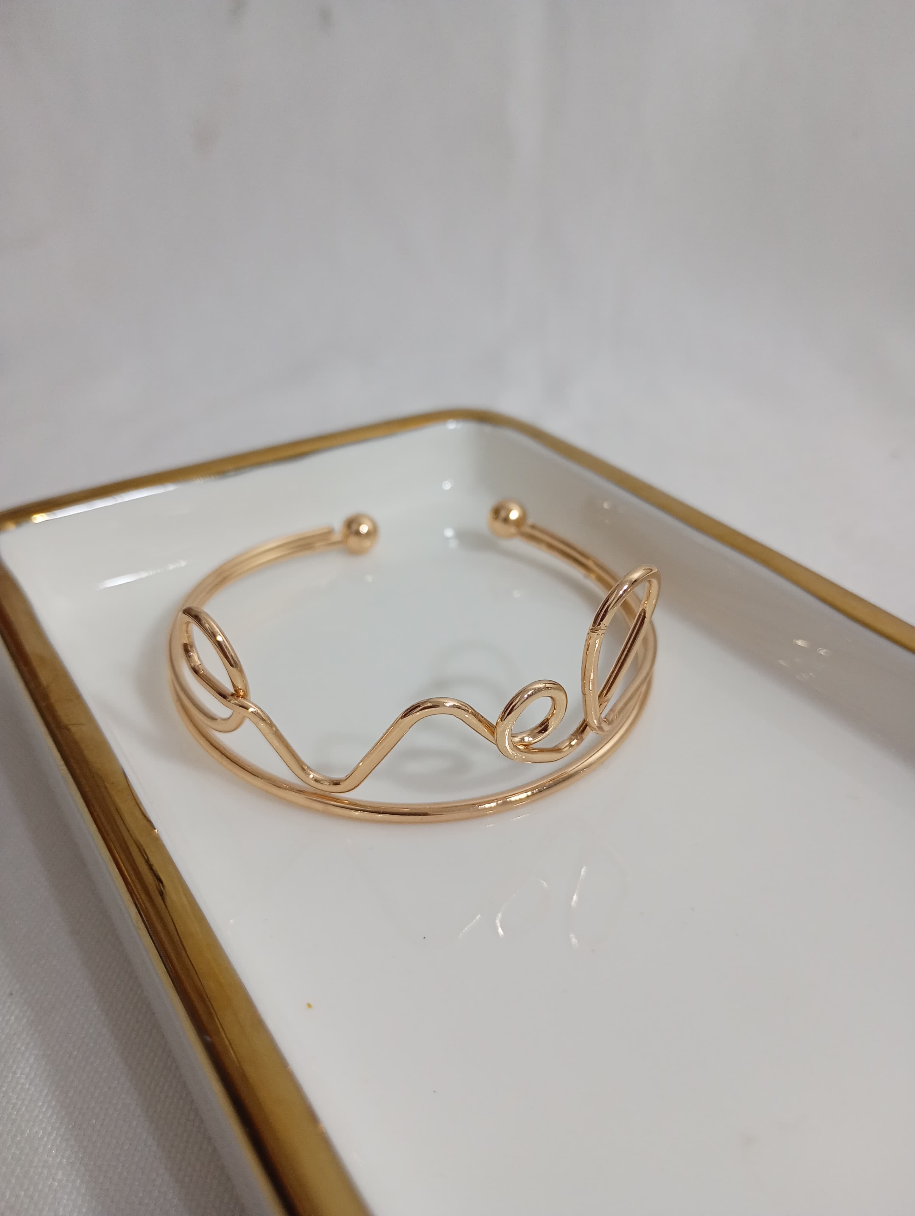 bracelete dourado regulável — foto 1